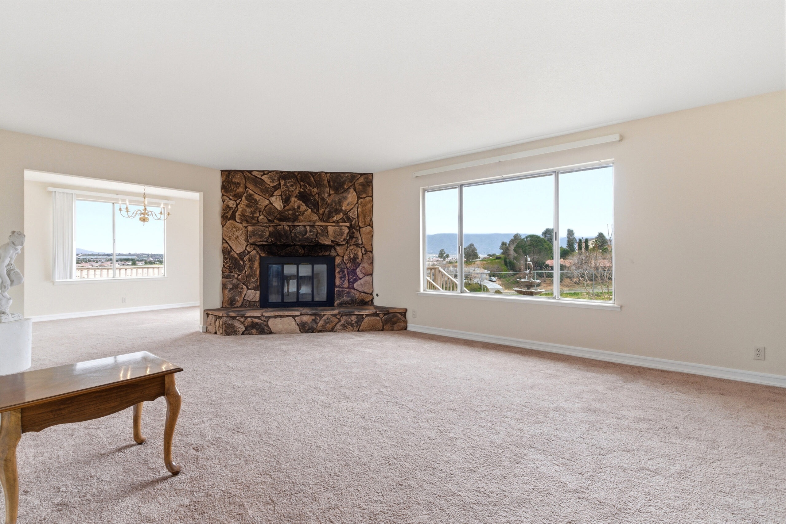 Living room with fireplace at 18785 Talisman in Hesperia