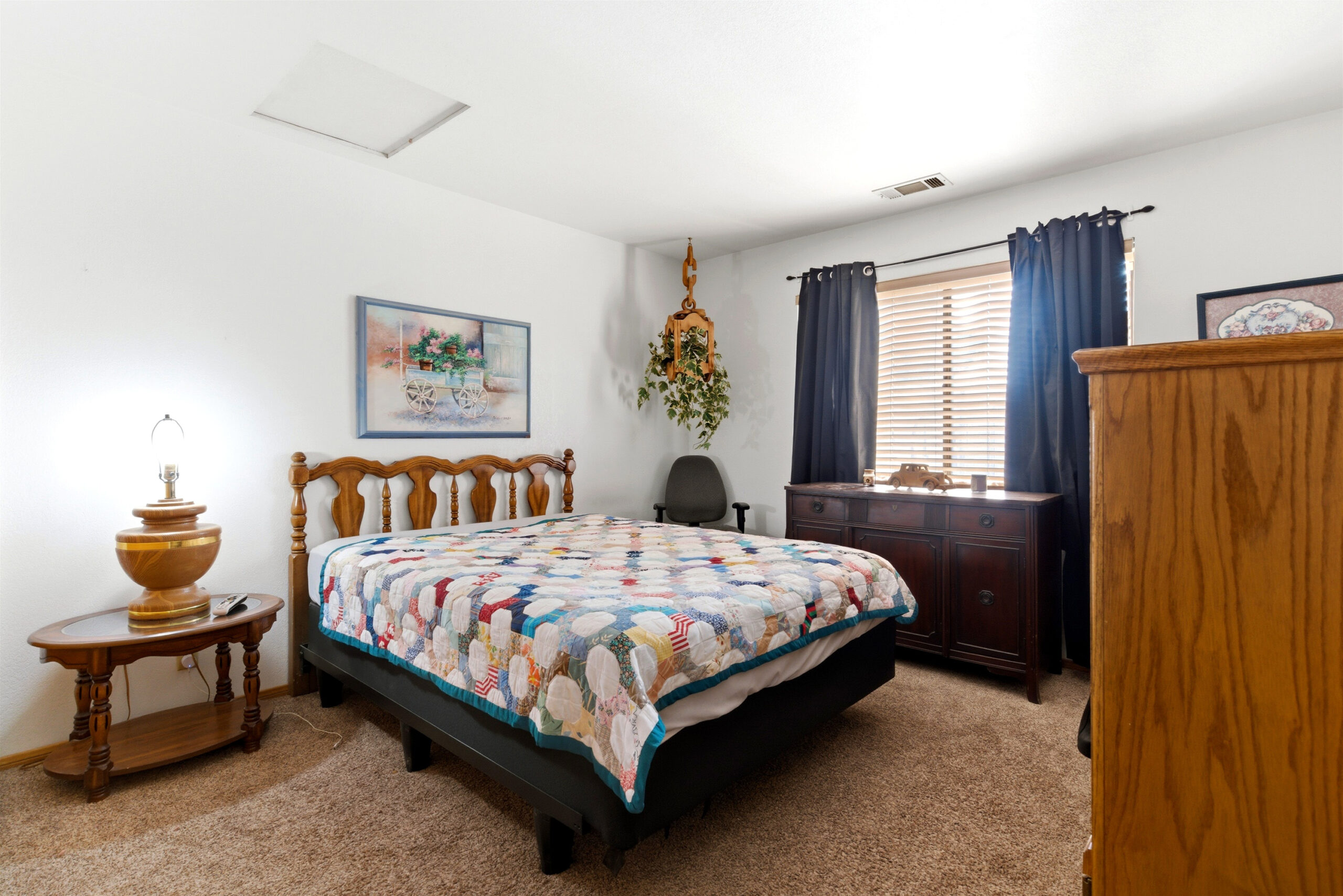Bedroom with carpet flooring at 11468 Kiowa Rd Apple Valley