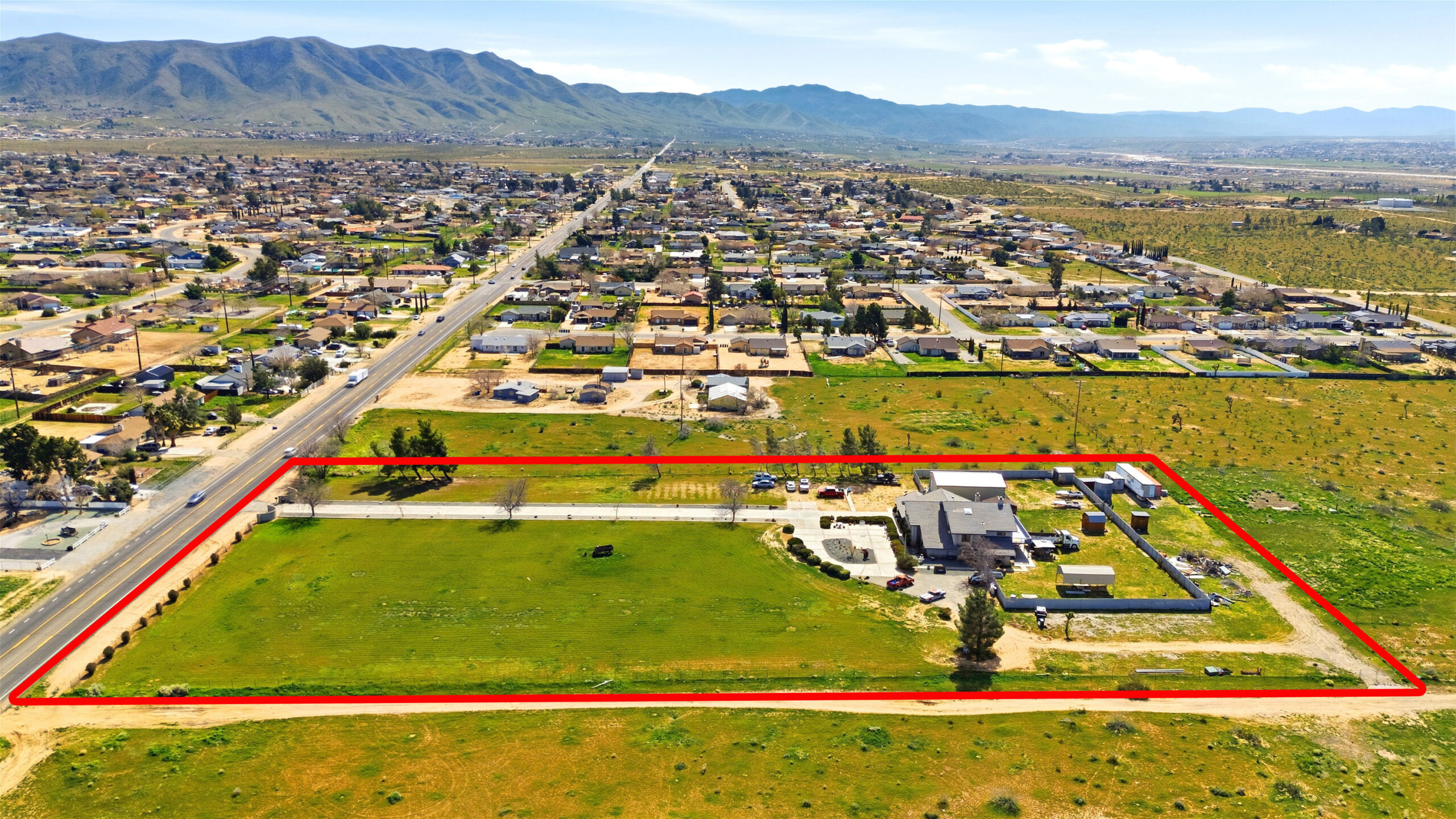 Aerial view of 11468 Kiowa Rd Apple Valley showing lot boundaries and surrounding neighborhood